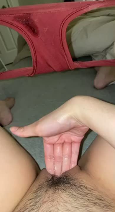 She orgasms with pleasure when she inserts her fingers